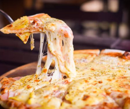 pizza hawaiian cheese on wood table. homemade food concept